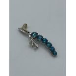 Blue zircons and pearl pendant. Estimate £300-350.
