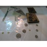 Collection of notes, coins and medals, together with 2 Russian icons. Estimate £10-20.