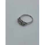 18ct white gold 3 stone old cut diamond ring, weight 2.7gms, size Q 1/2. Estimate £700-750.