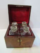Victorian mahogany campaign tantalus with 4 liqueur bottles. Estimate £150-200.