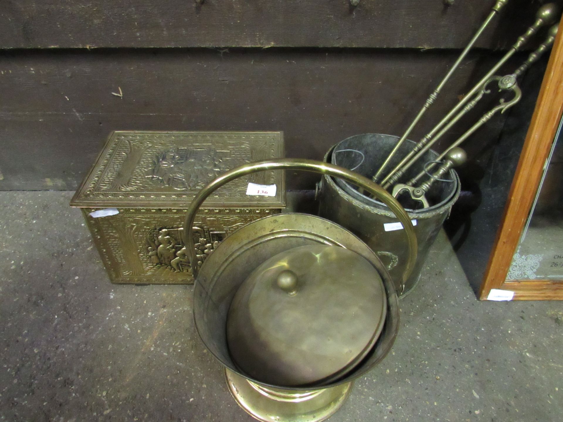2 brass coal buckets, fire dogs, brass fire irons and brass kindling box. Estimate £30-40.