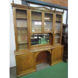 Oak glass top display cabinet with mirror and 2 cupboards to base. 210 x 42 x 236cms. Estimate £50-