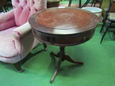 2 mahogany small drum side tables on pedestal legs. Estimate £10-20.