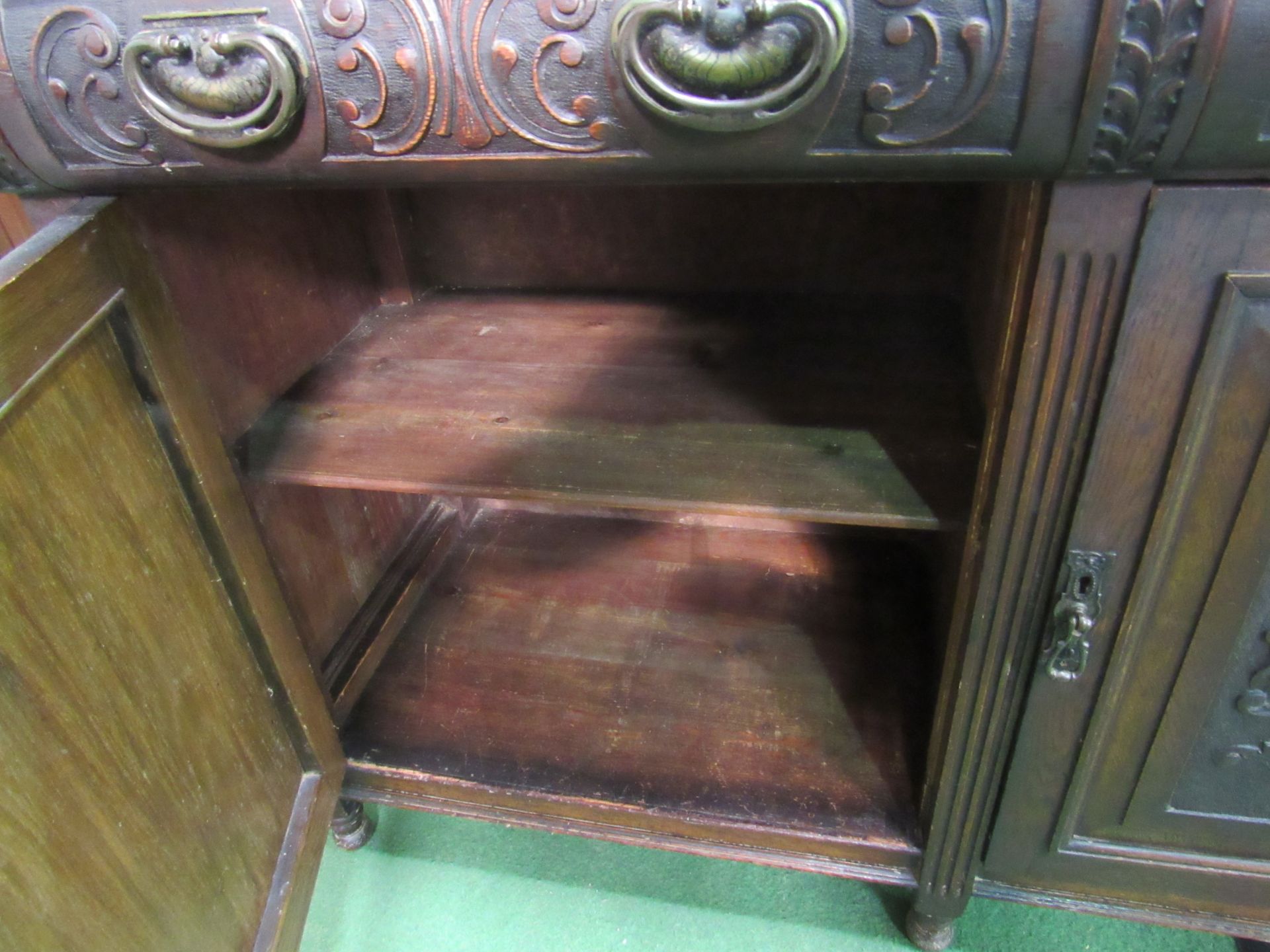 Oak sideboard with carved drawers and cupboard doors, 137 x 53 x 98cms. Estimate £10-20 - Image 5 of 5