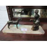 Large Art Deco bronze lady with her dog, mounted on variegated marble base. Estimate £60-90.