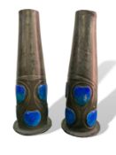 Pair of Archibald Knox for Liberty enamel on pewter vases number 0327, height 22cms. Estimate £