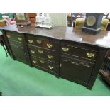 18th Century step fronted sideboard with 3 centre drawers flanked by 2 drawers with cupboards below,