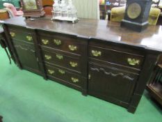 18th Century step fronted sideboard with 3 centre drawers flanked by 2 drawers with cupboards below,