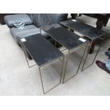 3 metal and black glass top side tables.