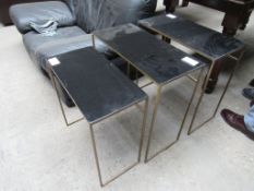 3 metal and black glass top side tables.