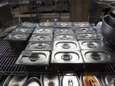 18 stainless steel gastronorms and lids.