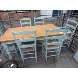 Laura Ashley pine top table and 5 string seat chairs and matching carver.