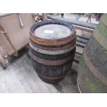 Smaller wooden barrel, diameter top 31cms, height 52cms.