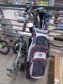 Wilson golf bag together with Wilson and G5 clubs and Powakaddy Highway trolley.