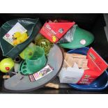 Box of pet cage bowls together with a box of other pet accessories.