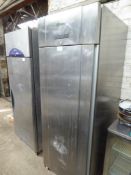 Gram stainless steel single door upright freezer.