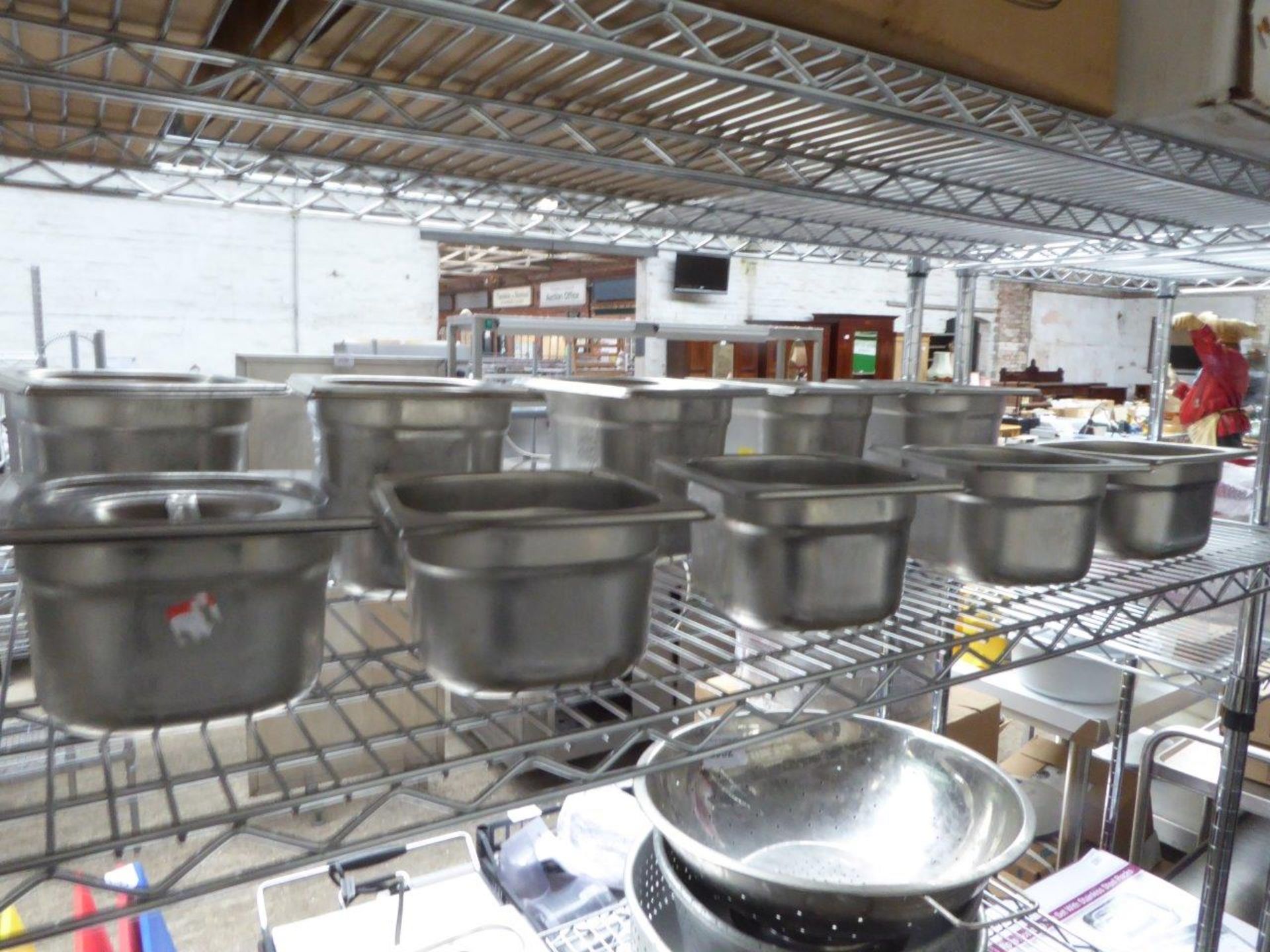 16 stainless steel gastronorms pots.