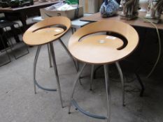 2 Lyra wood and chrome bar stools.