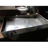 Stainless steel honey uncapping tray.