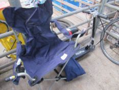 Folding canvas chair and play active electric scooter.