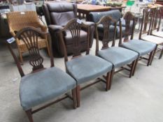 4 dining chairs with upholstered seat.