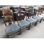 4 dining chairs with upholstered seat.