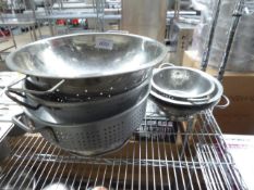 6 Stainless steel colanders.