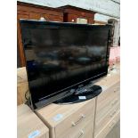 Samsung SS05 LE40A558P3FXXU TV and remote.