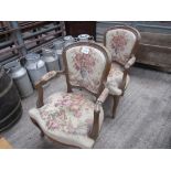 2 upholstered French style open armchairs.