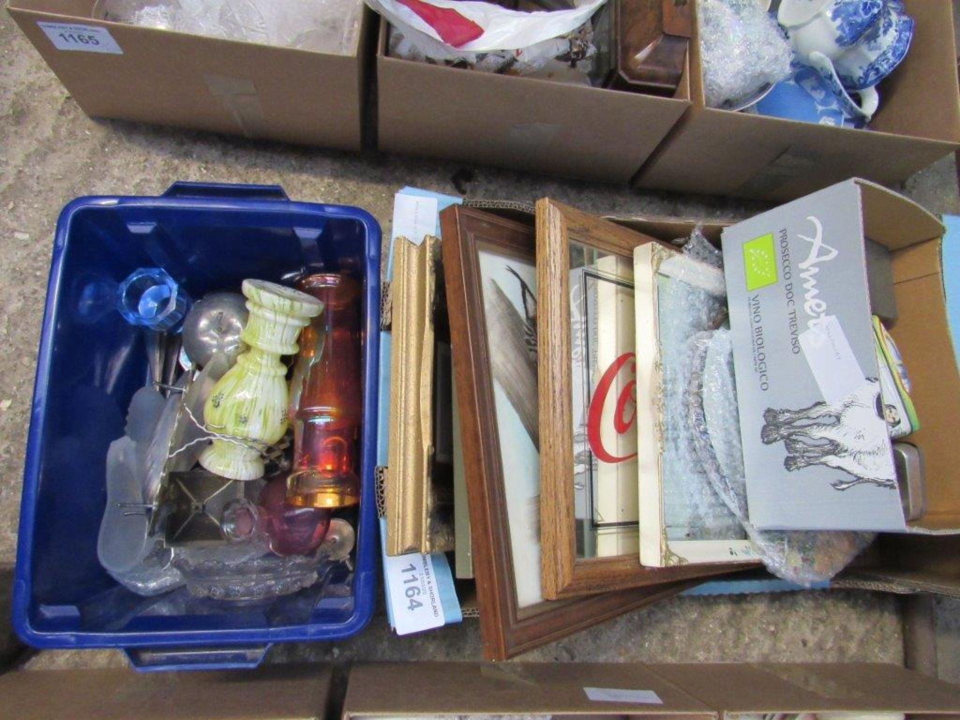 Box of glass ware and a box of assorted pictures.