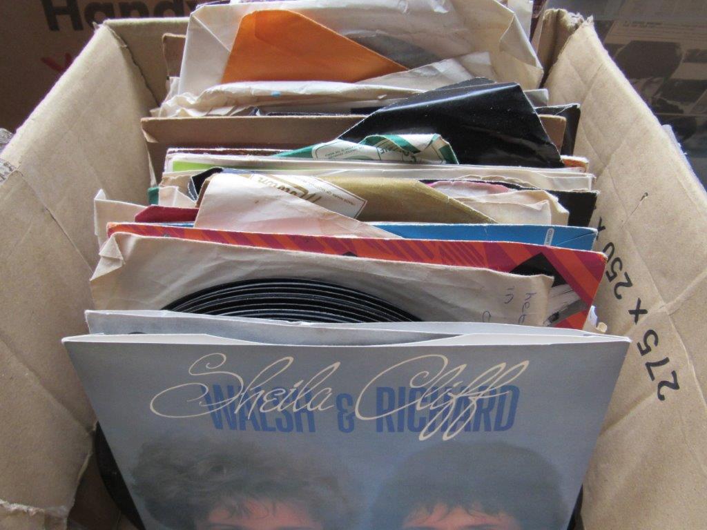 Box of 45's including The Beatles.