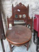 Over mantel mirror and glass top table.