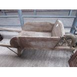 Antique wooden barrow.