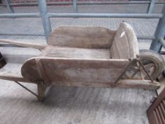 Antique wooden barrow.