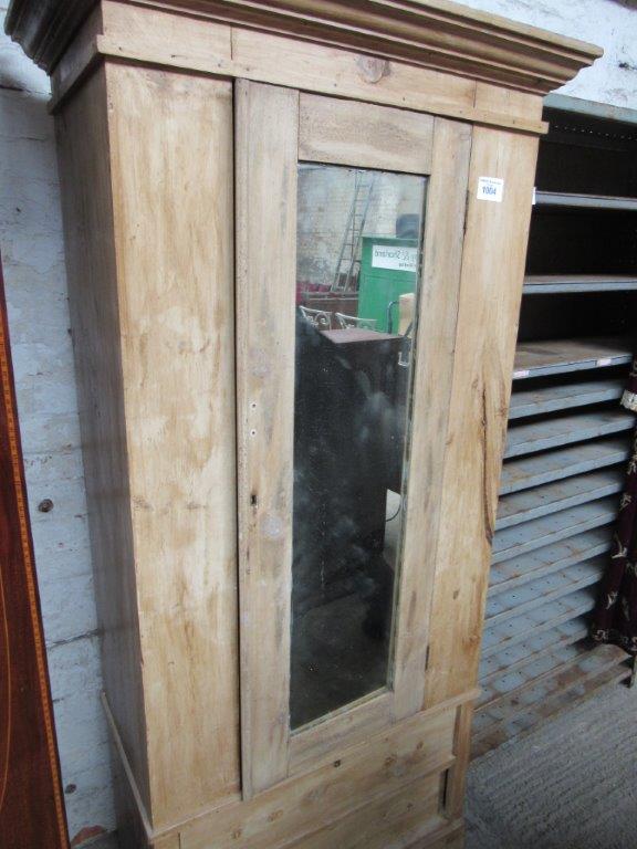 Pine single wardrobe with mirror door and 2 drawers to base.