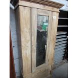 Pine single wardrobe with mirror door and 2 drawers to base.