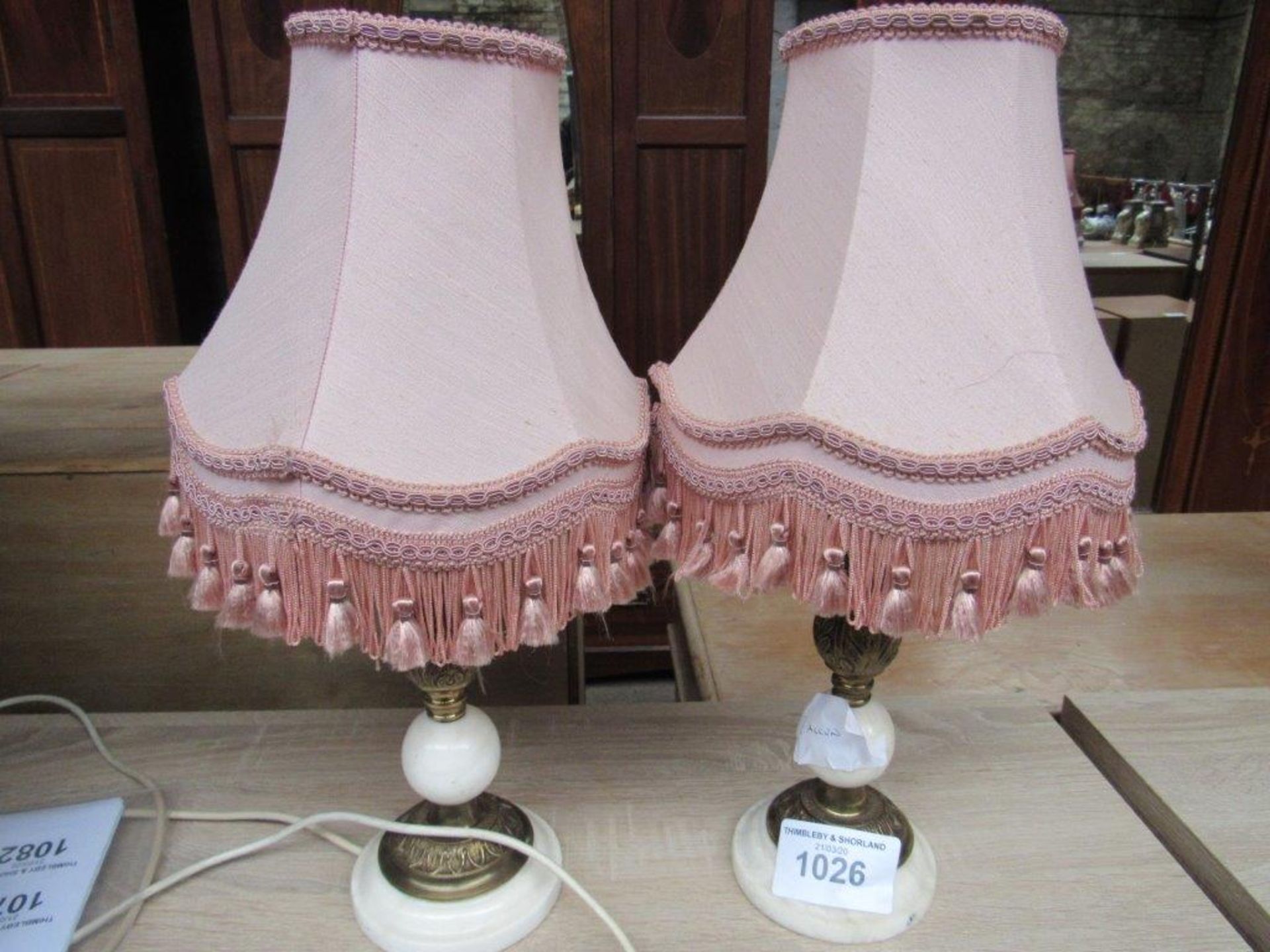 Pair of Onyx table lamps and shades, height of lamp 28cms. Brass and marble columned table lamp