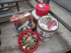 8 tins of assorted brass door furniture, casters etc.