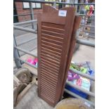 Pair of wooden louvred shutters. Height 125cms.