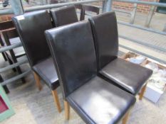 4 brown leather-effect high back chairs.