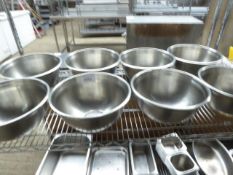 8 large stainless steel bowls.