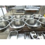 8 large stainless steel bowls.