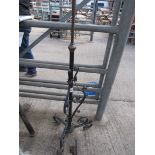 Wrought iron adjustable plant stand.