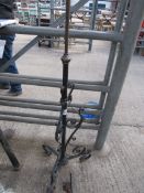 Wrought iron adjustable plant stand.