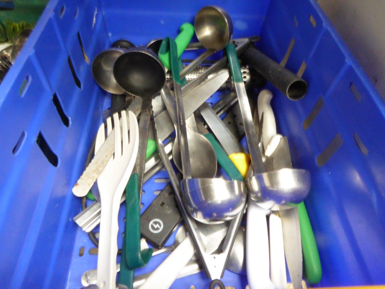 Tray of ladles and knives.