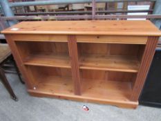 Set of low pine book shelves.