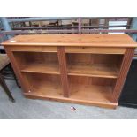 Set of low pine book shelves.