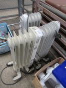 3 electric oil-filled heaters.