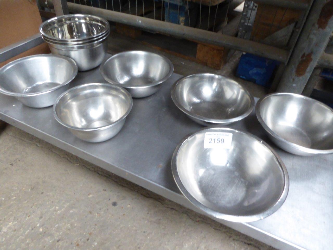 9 stainless steel bowls.