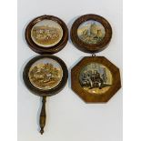 Four 19th Century pot lids in wooden frames